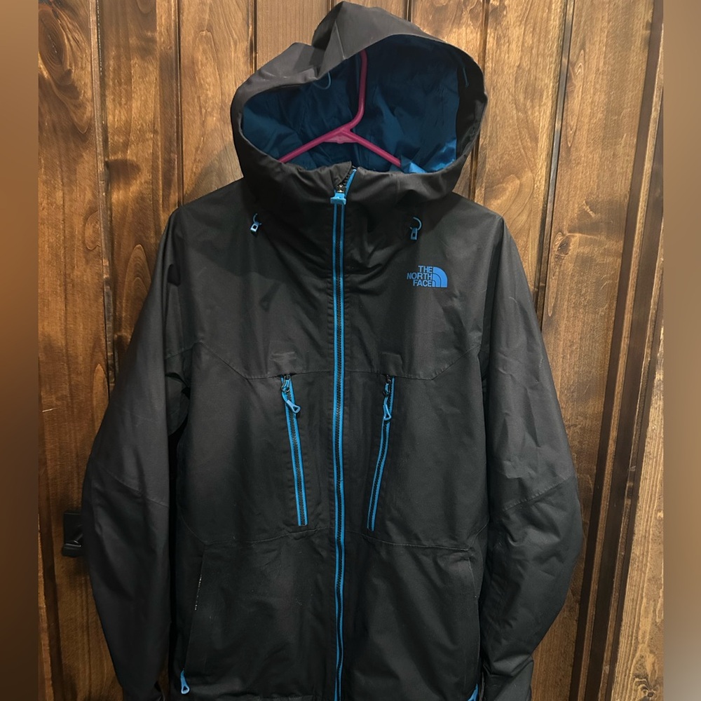 The North Face Men's Black Performance Jacket with Blue Accents
